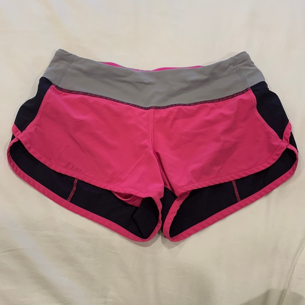 Lululemon cute and soft pink and black color-block lined shorts